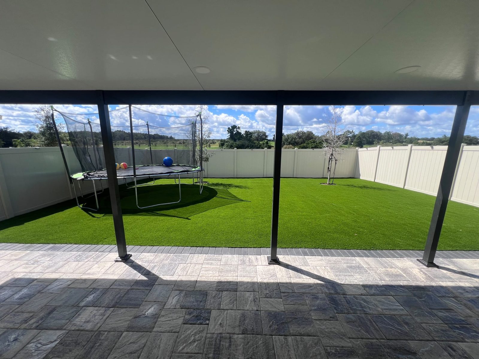 Paver Patio, Screened Lanai and Artificial Turf