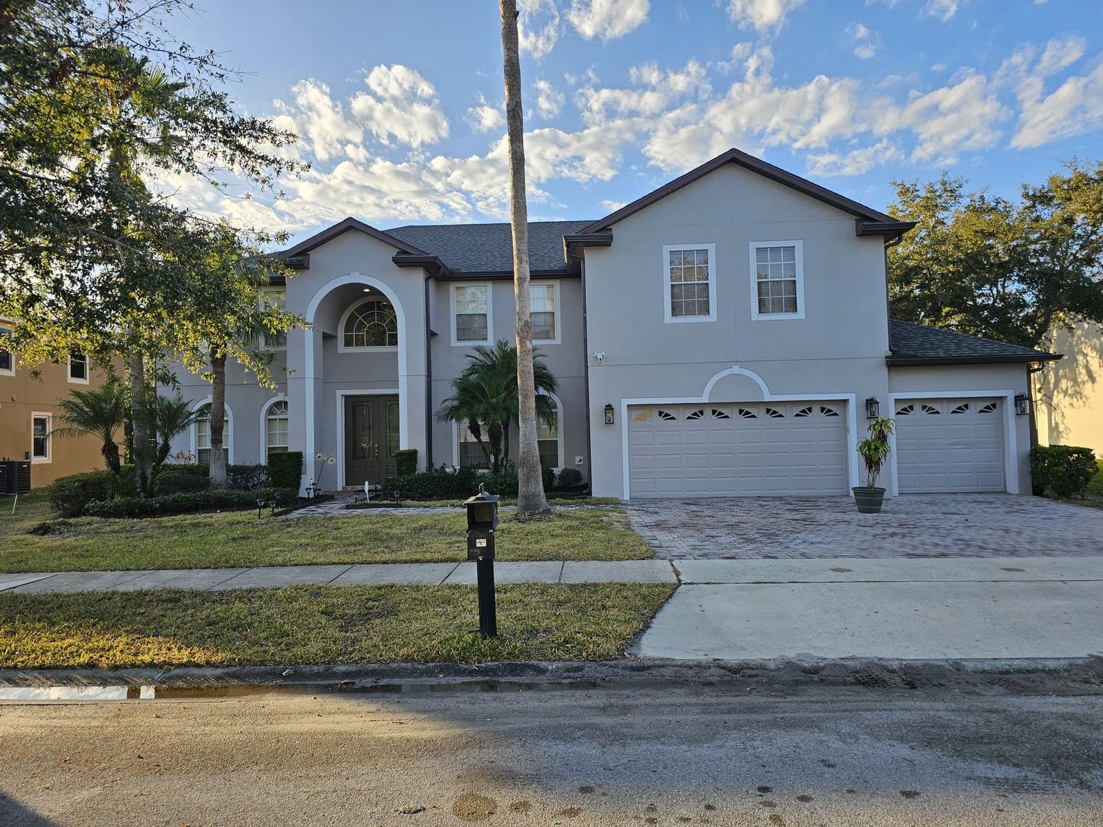 Whole-House Exterior Repaint, Stucco and Garage Doors