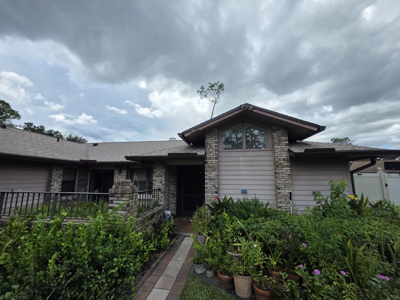 Exterior Repaint, Stucco Repairs and Siding Replacement
