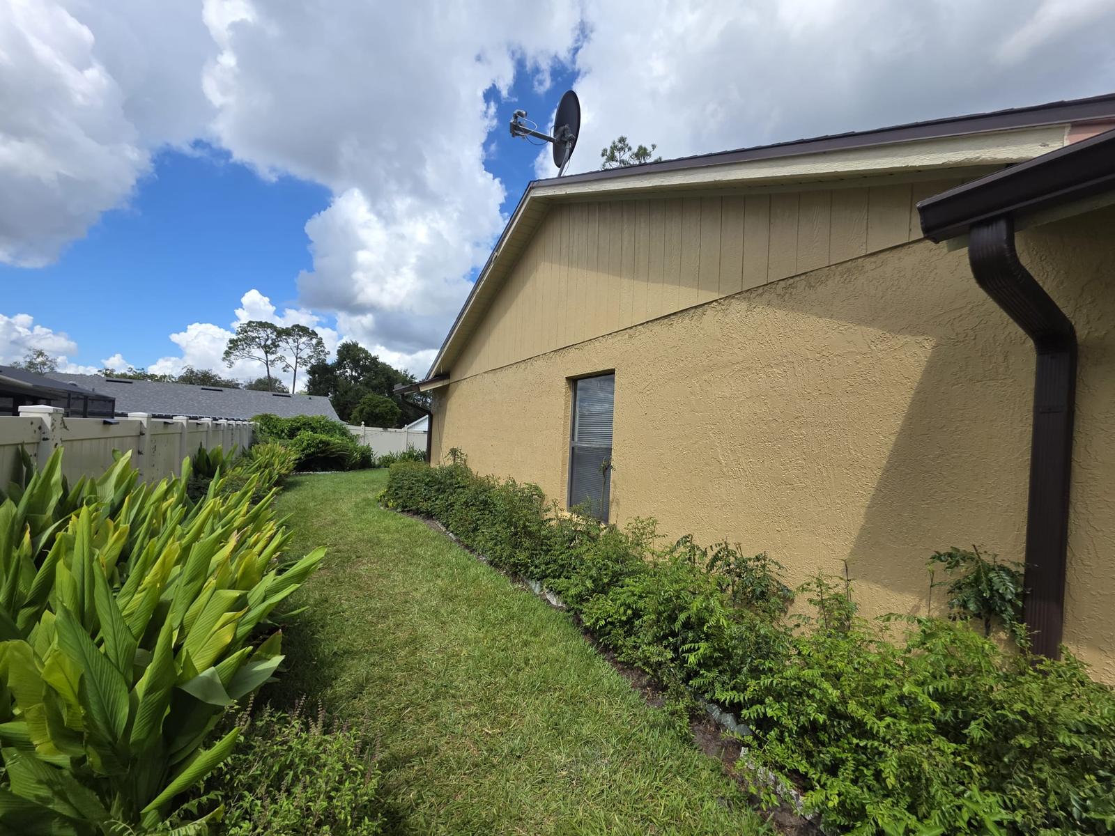 Exterior Repaint, Stucco Repairs and Siding Replacement
