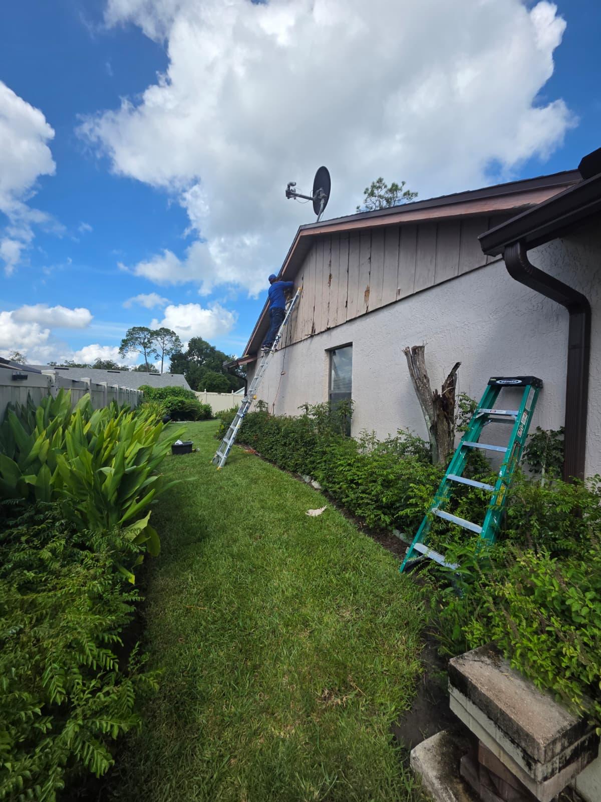 Exterior Repaint, Stucco Repairs and Siding Replacement
